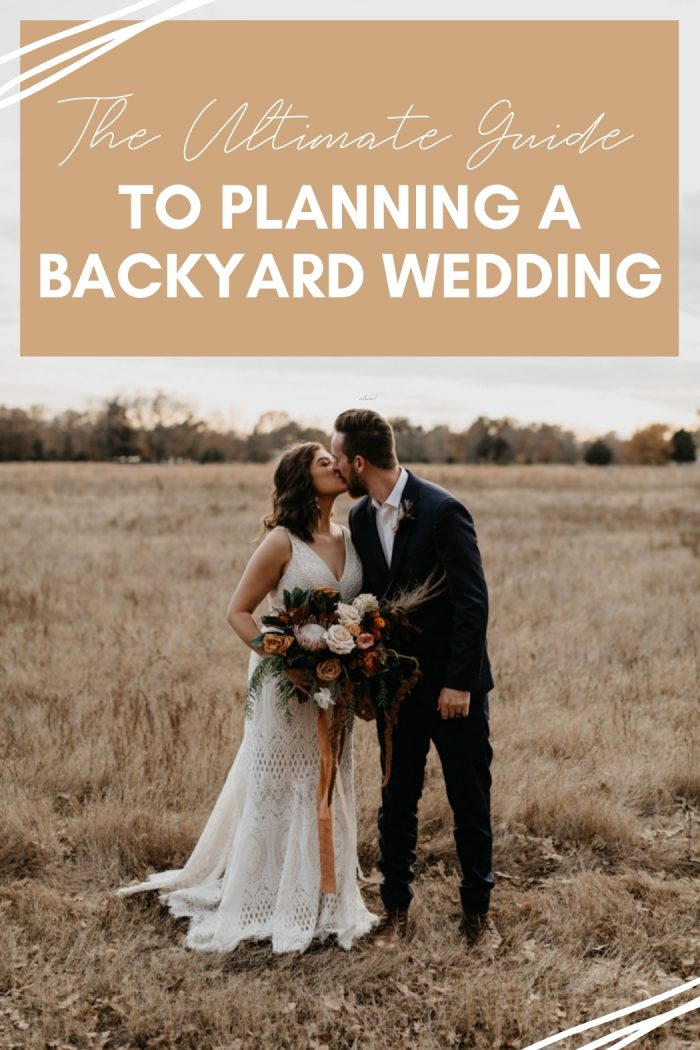 couple kissing at a backyard wedding