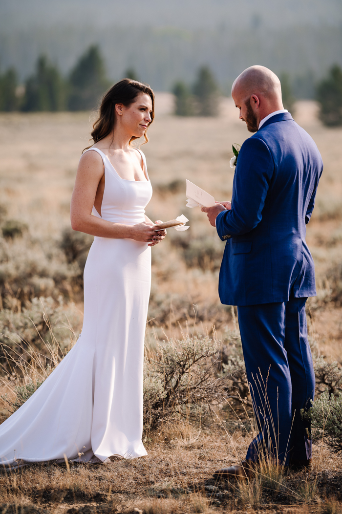 couple reading their wedding vows